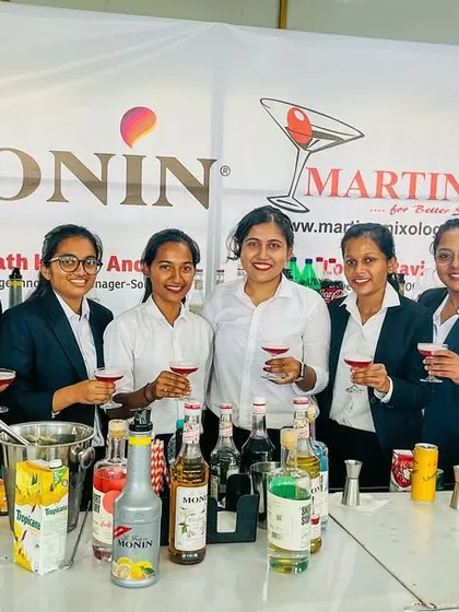 Cheers to learning. Students toast with their creations at the end of a successful mocktail workshop.