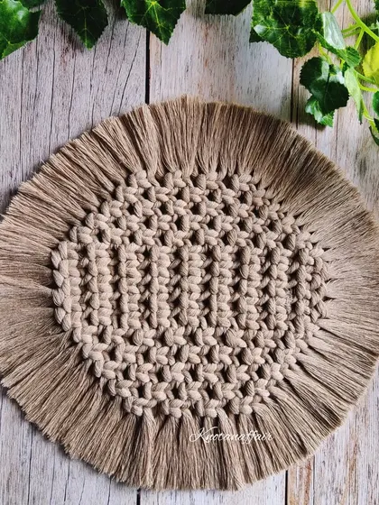 Add some handmade charm to your home with this pretty and unique macrame round placemat. It's a great eco-friendly and sustainable option.