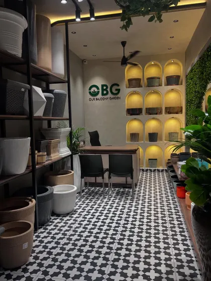 Another view of our upcoming Surathkal store. We've used beautiful black and white floor tiles and a vertical green wall to create a chic and inspiring space for you.