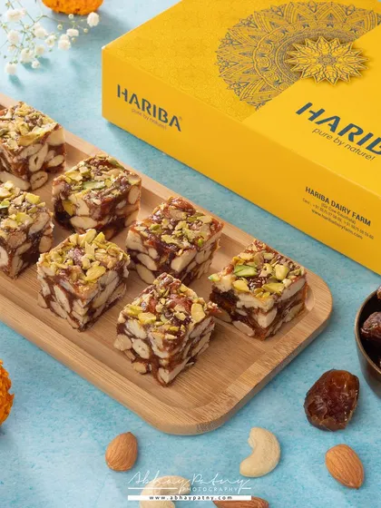These healthy date and dry fruit sweets are presented in a clean, bright style. The composition shows the product both in its attractive packaging and ready to eat, covering both e-commerce and lifestyle needs.