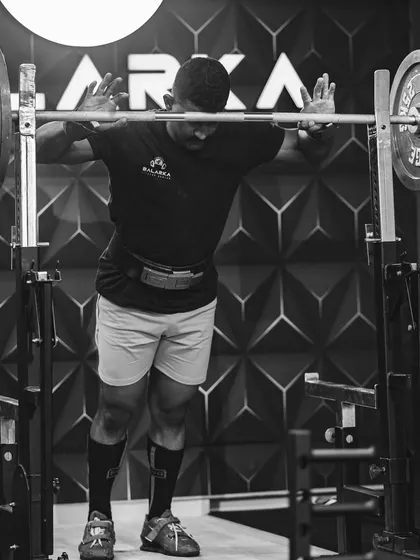 Day 9 of my challenge. A moment of focus before getting under the bar. It's not just about lifting heavy, it's about surrendering to a higher power and trusting the process.