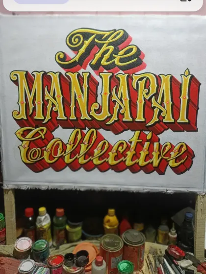 The finished painting for 'The Manjappai Collective' before the decorative border was added. You can see the precision in the 3D lettering and shading.