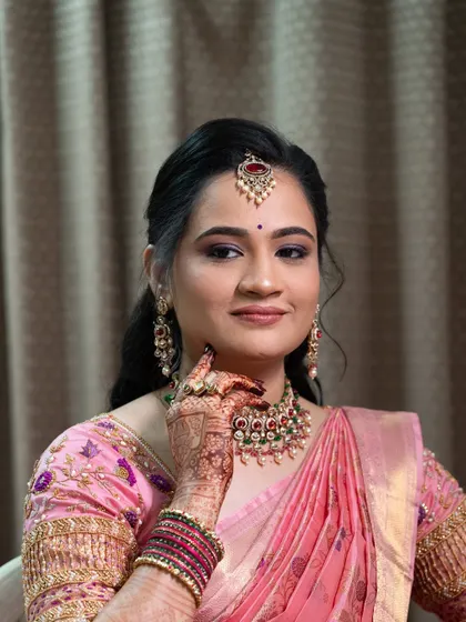 A close-up of Vibha's makeup, showing the delicate definition and soft colors used to create this sophisticated look.