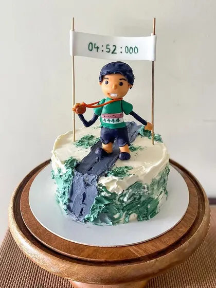 A full view of the cake celebrating an amazing athletic achievement.