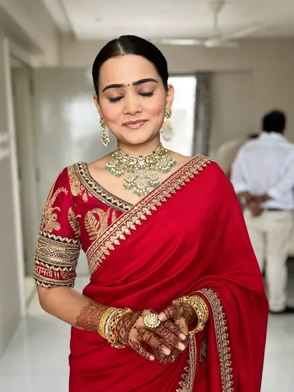 Eyes closed to show the simplicity of the makeup. Just a clean base, defined brows, and a hint of colour on the lips are needed to create this beautiful look.
