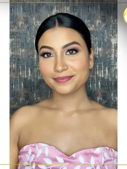 A full view of the soft and elegant party makeup. The sleek hair and glowing complexion come together to create a sophisticated look that I teach in my personal grooming workshops.