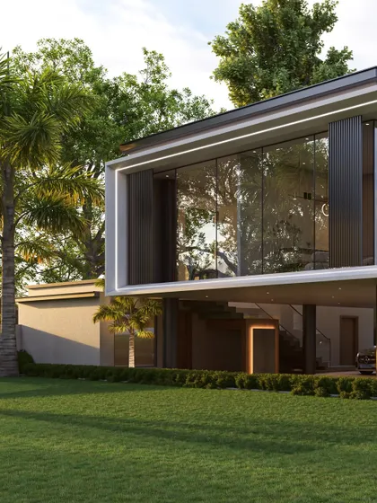 The outhouse's modern design is highlighted by clean lines and a minimalist palette. The glass walls make the interior visible, suggesting a space that could serve as a stylish office, gym, or guest suite.