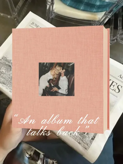We call it "an album that talks back" because flipping through the pages feels like reliving the conversations and laughter. This beautiful pink linen album holds a special photo, a preview of the stories inside.