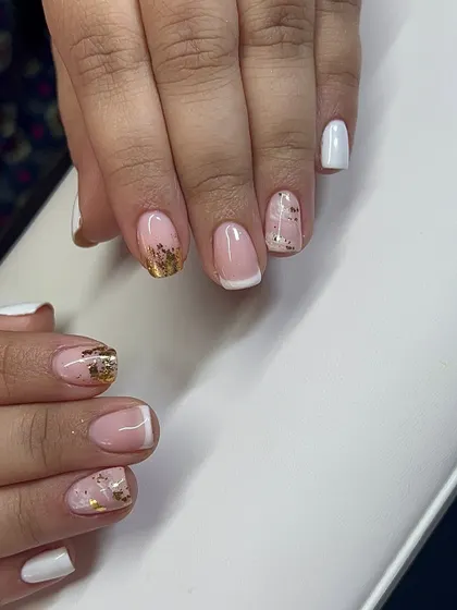 Another view of this elegant set, showing the different designs on each nail.