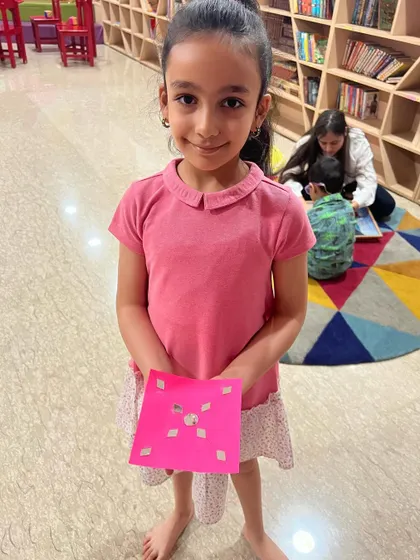 Another happy camper with her beautiful craft project. Seeing their proud faces is the best reward.