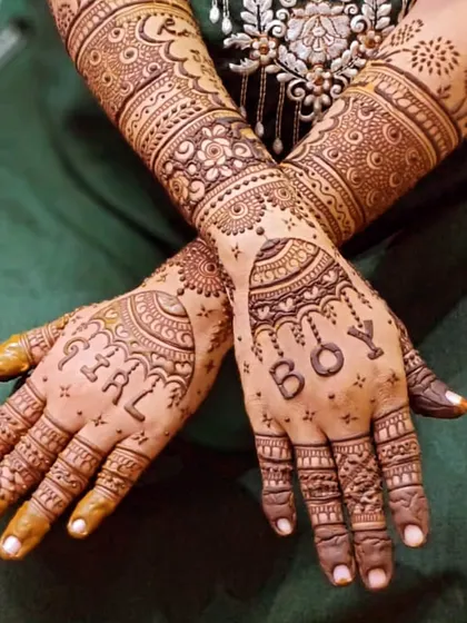 A sweet and simple baby shower design. We hid the words "GIRL" and "BOY" in the patterns to add a fun little secret to the mehendi.