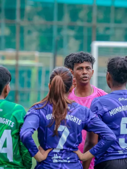 A mid-game huddle with the coach, discussing tactics and strategy. Communication and adaptability are key to our success.