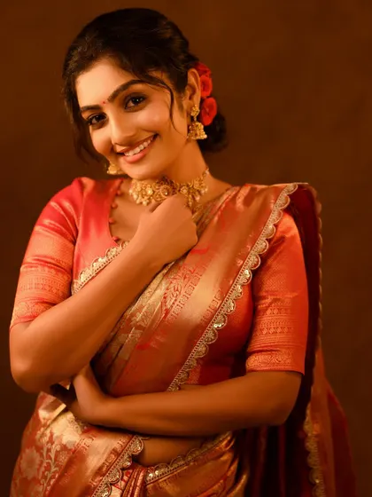 That festive glow is real. A beautiful smile to go with a beautiful saree.