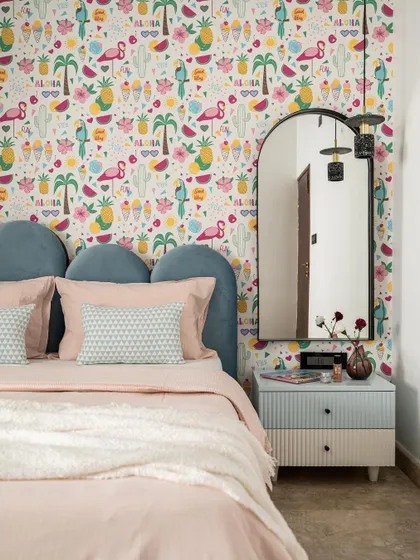 A glimpse into a vibrant kid's room where I used a playful flamingo wallpaper as the main feature. The design balances fun aesthetics with functional elements like a custom headboard and bespoke side tables, creating a space that is both cheerful and practical.