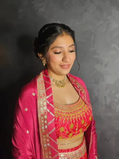 A close-up of Labdhi's soft, glowing makeup.