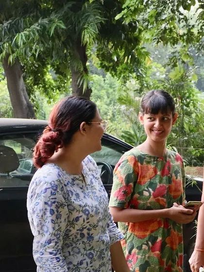 Participants of the 'Wild Food Walk' interacting and learning about local edible plants.