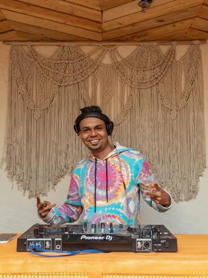 A daytime gig at Koa Cafe & Bar in Thane. This shows a more relaxed, bohemian setup perfect for brunch parties or afternoon events.