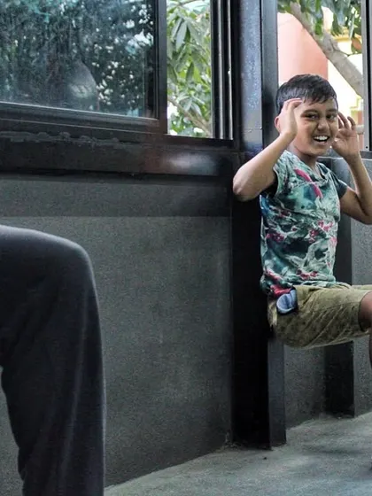 Even our youngest members learn the importance of conditioning. A wall sit might look simple, but it builds serious leg endurance and mental toughness.