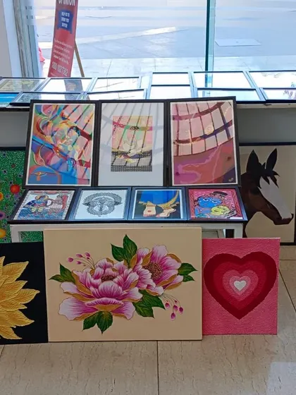 Beautiful paintings by our Fine Arts students on display at the International Women's Day event, showcasing their talent to a wider audience.