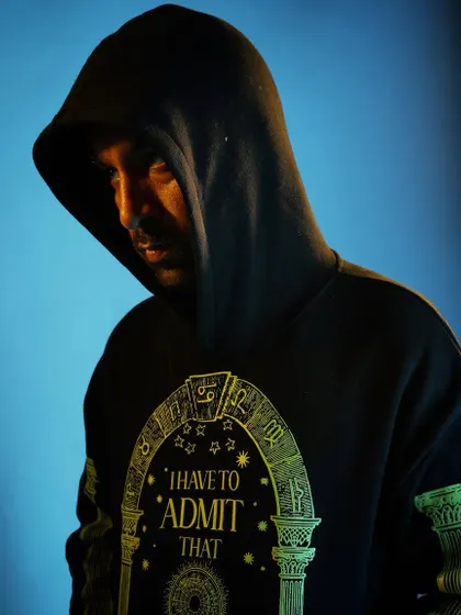 In the zone, with the hood up. This shot captures the focus and intensity I bring to my music.