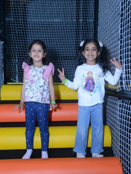 More friends enjoying the play structures during a fun-filled birthday celebration.
