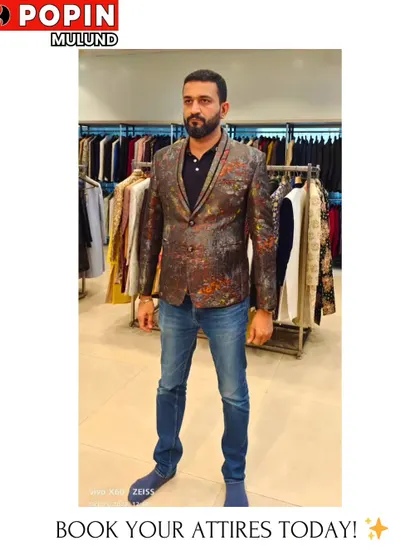 This client is testing out a patterned designer blazer. The unique print makes it a standout piece that can elevate a simple outfit.