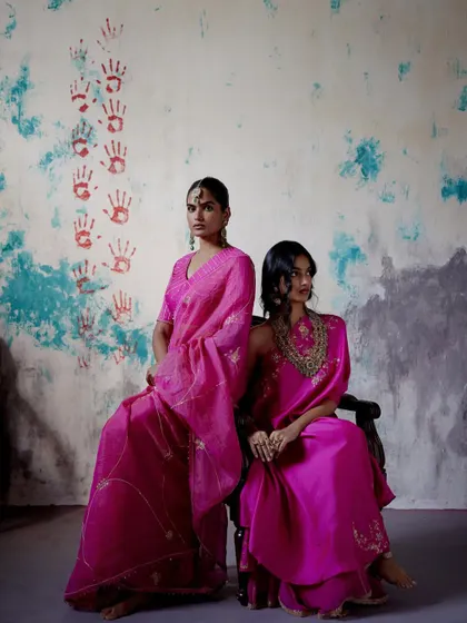 A portrait of elegance in shades of pink. I love creating these coordinated looks that feel like a story, using different textures and drapes to highlight each person's individuality.
