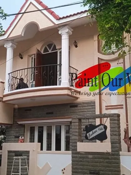 This angle highlights the clean lines and fresh color on the home's facade and balcony. Our professional painters ensure every corner is perfectly finished for a flawless look.