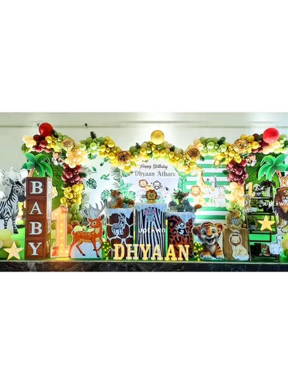 A wide shot of the jungle party, showing the 'BABY' blocks and character placements.