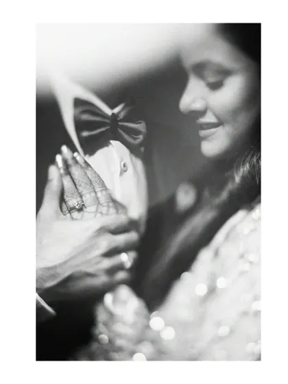 A classic, timeless moment captured in black and white. This image from an engagement session focuses on the gentle touch, the soft smile, and the deep emotion between the couple. It proves that sometimes, the simplest frames hold the most powerful stories.