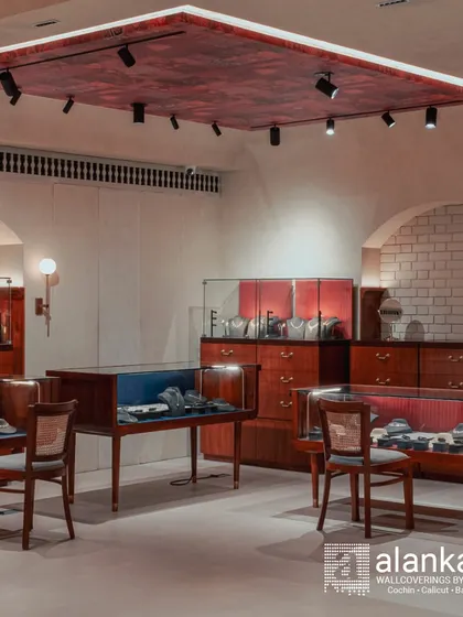 My expertise extends to creating luxurious commercial environments. For this high-end jewelry showroom, I designed and crafted bespoke display cases, seating, and architectural elements like the textured ceiling panel to create an unforgettable retail experience.