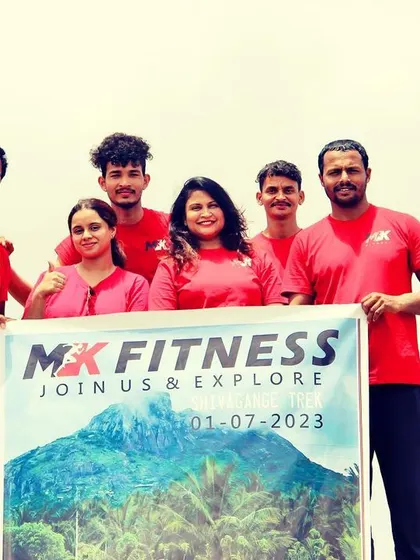 Another shot of our fitness club collaboration, celebrating a successful trek together. These events are great for team building and creating lasting memories.