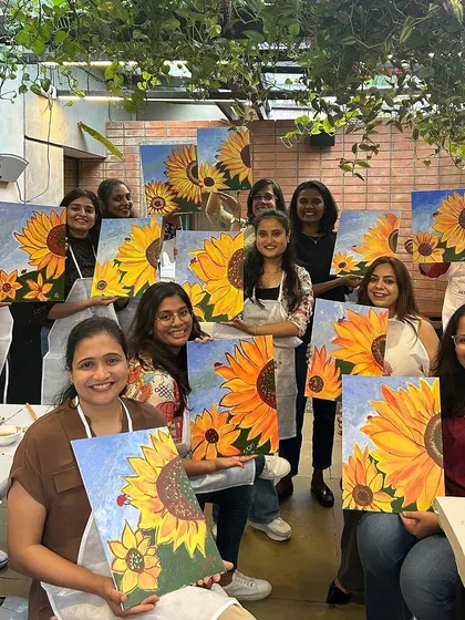 The team from EYGBS enjoying a corporate sip and paint workshop at BrikOven in Indiranagar. A great venue, good food, and a creative outlet make for the perfect team bonding event.