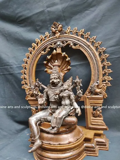 A side view of the Lakshmi Narasimha wax model, showcasing the depth and three-dimensionality of the piece before it moves to the next stage of the lost-wax process.