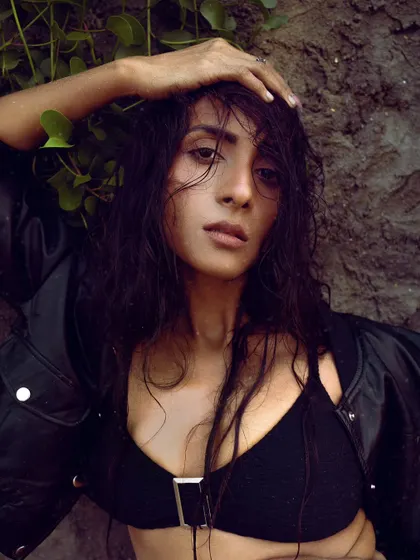 A raw and beautiful close-up with wet hair, as if just emerged from the water. This adds an authentic and sensual feel to the portfolio.