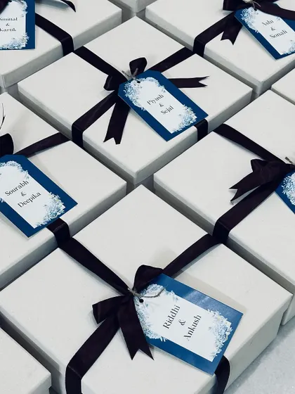 A grid of perfectly wrapped and tagged gift boxes, showcasing our attention to detail for large orders.