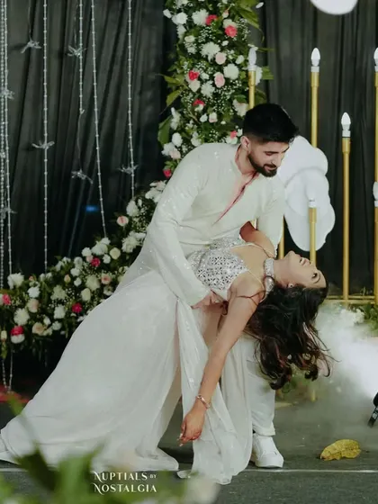 A dramatic dip with smoke effects, creating a cinematic and unforgettable moment for this couple's performance.