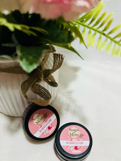 Keep your lips soft and hydrated with my handmade Bubblegum lip balm. It's infused with nourishing shea butter and essential oils for all-day protection.