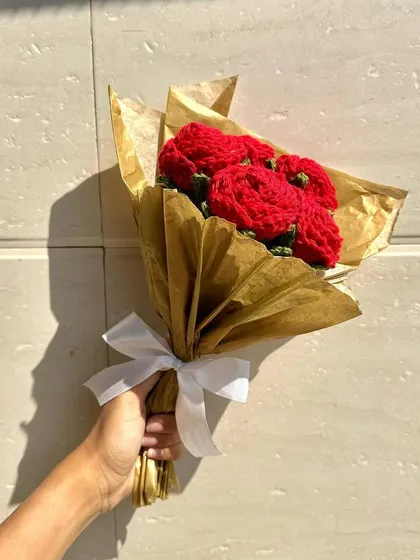 Another angle of our stunning red rose bouquet, showing the rich color and texture of the crochet work. Each petal is carefully shaped to create a realistic and beautiful flower.