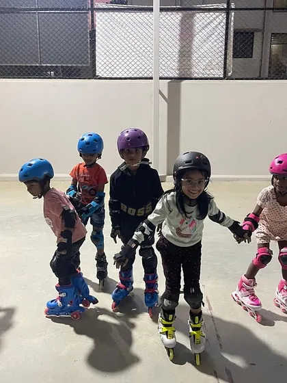 A group of new skaters poses for a photo, excited to be part of the class. We love seeing the enthusiasm of our students as they embark on their skating journey.