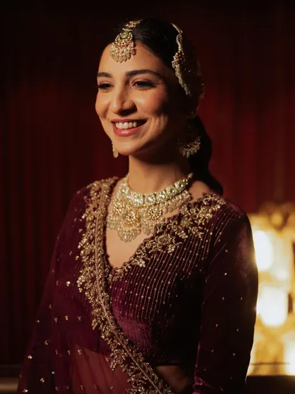 Another shot of this beautiful reception look. Her smile and the soft glow of her skin are the main highlights.
