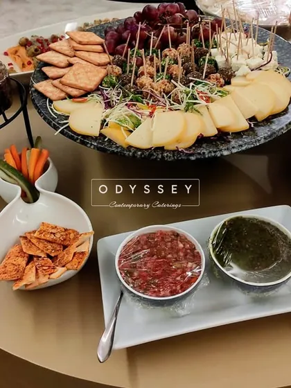 Our grazing tables feature an assortment of cheeses, crackers, and exquisite dips like this vibrant beetroot and classic green chutney. We ensure every element is fresh and full of flavor.