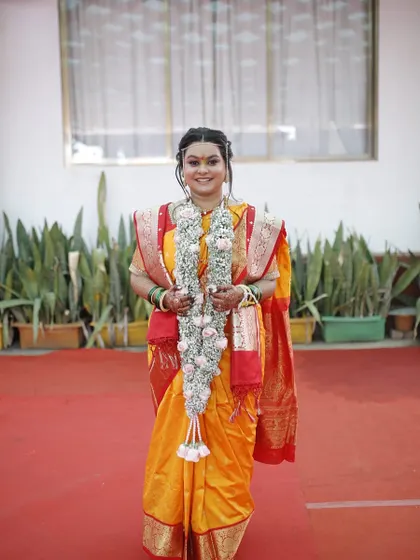 A full-length shot of a happy bride, ready for her wedding. This is the kind of bridal glow I aim to create for all my clients.