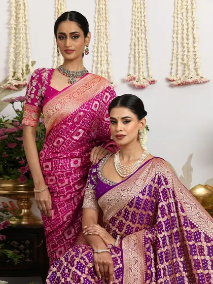 A close-up portrait that captures the regal beauty of these heritage handloom sarees.