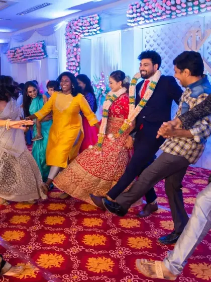Friends from all walks of life come together to form a dance train with the bride and groom. The sangeet is a beautiful place for new friendships to form.