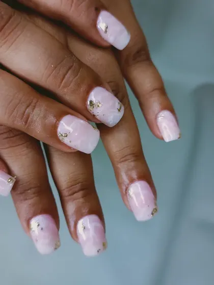 A soft pink quartz marble design, with delicate gold foil flakes embedded for a touch of luxury.
