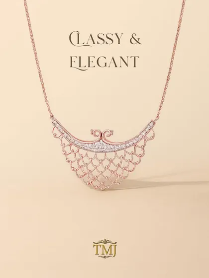Classy and elegant, this rose gold and diamond necklace features a delicate, web-like design that drapes beautifully on the collarbone. It is a piece of wearable art.