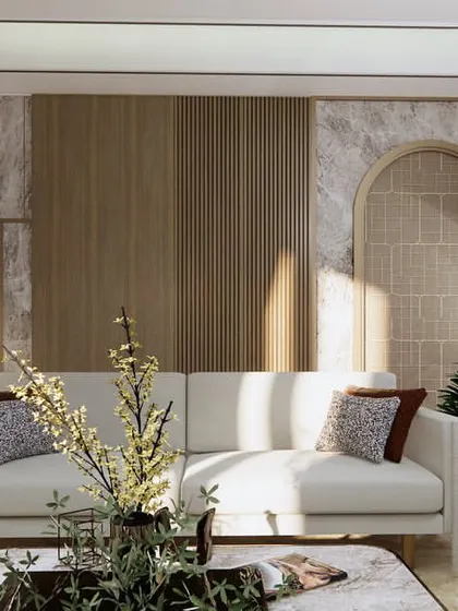 A bright and airy drawing room where we used a mix of textures, including marble and wood-paneled walls. The design creates a welcoming atmosphere with comfortable seating and ample natural light.