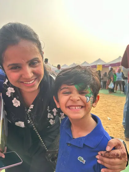 This happy boy and his cool snake face paint made my day at the festival. It's always a joy to see their faces light up.