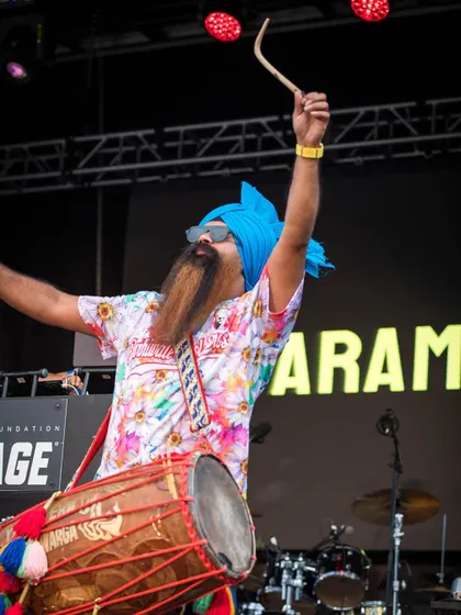 The dhol is essential. Param Singh on the dhol, adding that thunderous, irresistible beat that defines a true Bhangra party.